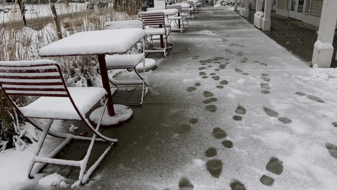 It wasn't a good day for outdoor dining as the snow fell heavily in West Acton, Oct. 30, 2020.  [Wicked Local Staff Photo/Ann Ringwood]