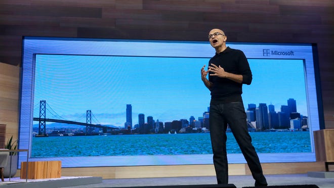 Microsoft CEO Satya Nadella speaks at Microsoft's annual "Build" conference in San Francisco, Wednesday, April 29, 2015. While Microsoft has already previewed some aspects of the new Windows 10, a parade of top executives will use the conference to demonstrate more software features and app-building tools, with an emphasis on mobile devices as well as PCs. (AP Photo/Jeff Chiu)