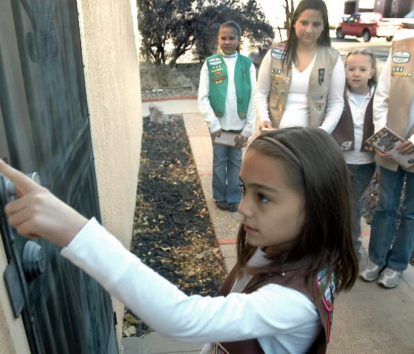 Girl Scouts selling cookies in New Mexico.