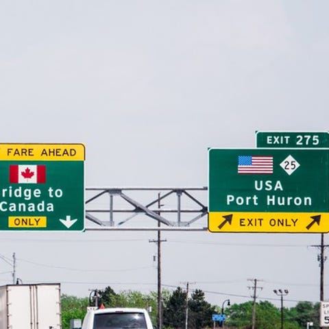Highway signs to Canada and exit to USA