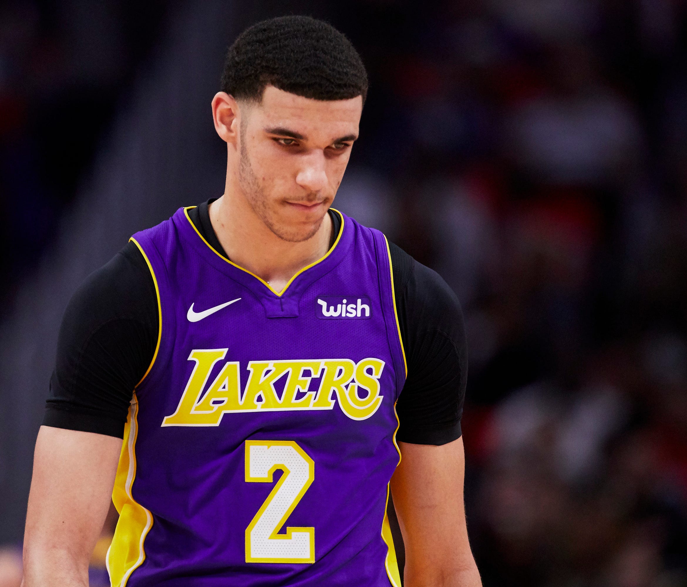 Los Angeles Lakers guard Lonzo Ball reacts during the second half of a game against the Detroit Pistons.