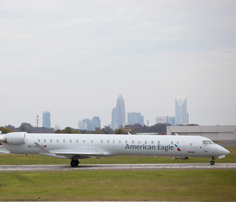 This file photo from Oct. 31, 2015, show an American Eagle Bombardier CRJ-900 regional jet at at Charlotte Douglas International Airport.