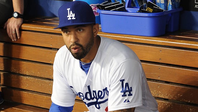Los Angeles Dodgers center fielder Matt Kemp sits in the dugout prior to a game against the Colorado Rockies at Dodger Stadium.