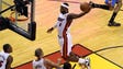 Miami Heat small forward LeBron James (6) dunks against