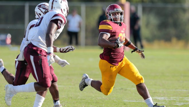 JCJC running back Scott Phillips (22) gains some of his 219 yards Saturday vs. Hinds.
