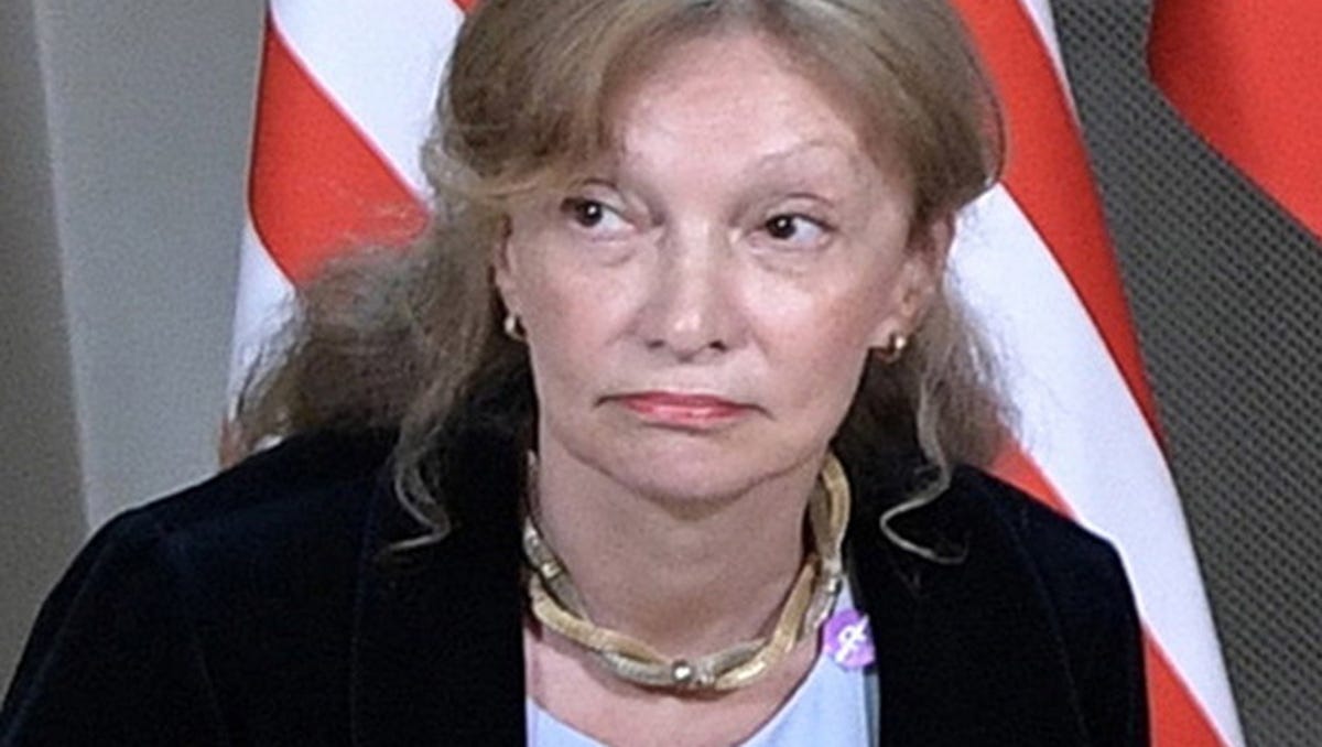 US interpreter Marina Gross looks on during a meeting between Russian President Vladimir Putin and US President Donald J. Trump (both not pictured) at the Presidential Palace in Helsinki, Finland, 16 July 2018