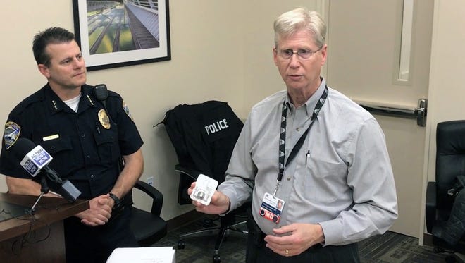 Dr. Jeffrey Bosworth, chief medical officer for Shasta Community Health Center and a member of the NoRxAbuse coalition, demonstrates how to administer naloxone nasal spray to someone overdosing on opioids.