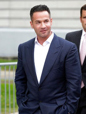 FILE- In this Sept. 24, 2014 file photo, Mike "The Situation" Sorrentino leaves the MLK Jr. Federal Courthouse in Newark, N.J., after a court appearance. After previously pleading not guilty to charges that they filed bogus tax returns on nearly $9 million and claimed millions in personal expenses as business expenses, "Jersey Shore" reality TV show star Michael "The Situation" Sorrentino and his brother have had additional tax fraud charges filed against them on Friday, April 7, 2017.