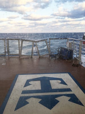 This image made available by Flavio Cadegiani shows damage to the deck of Royal Caribbean's ship Anthem of the Seas, Monday, Feb. 8, 2016. The ship ran into high winds and rough seas in the Atlantic Ocean on Sunday, forcing passengers into their cabins overnight. No injuries were reported and only minor damage to some public areas. The ship is turning around and sailing back to its home port in New Jersey. (Flavio Cadegiani via AP)