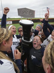 Butler players celebrate Big East softball championship.