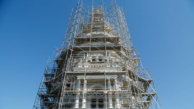 Scaffolding encircles the dome of the Tippecanoe County Courthouse Tuesday, September 20, 2016, downtown Lafayette. The dome is currently undergoing extensive repair and restoration. Although the dome looks to be built of stone, it is actually constructed of steel. Total cost of the project, which will take 18 months to complete, is $3.5 million. 