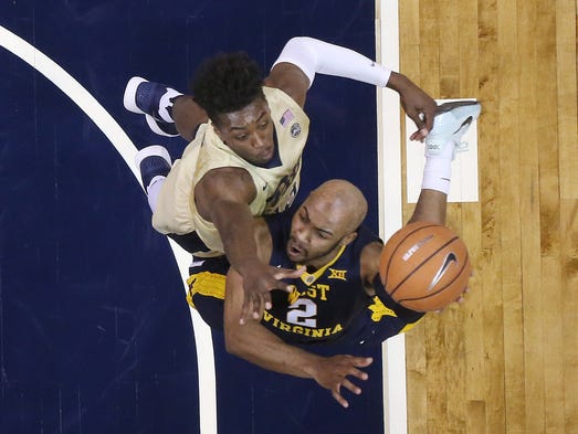 Dec. 9: West Virginia guard Jevon Carter (2) shoots