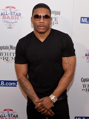 Nelly, pictured attending the MLB.com All-Star Bash sponsored by Firestone, Captain Morgan White Rum and Buffalo Wild Wings at Epic on July 13, 2014 in Minneapolis, Minnesota.