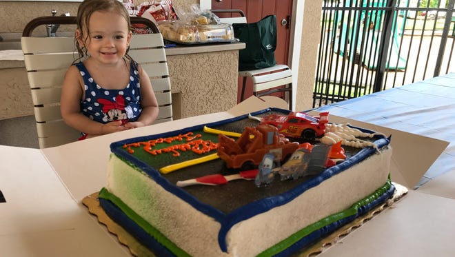 Isabella loved her Disney's "Cars" themed birthday cake.
