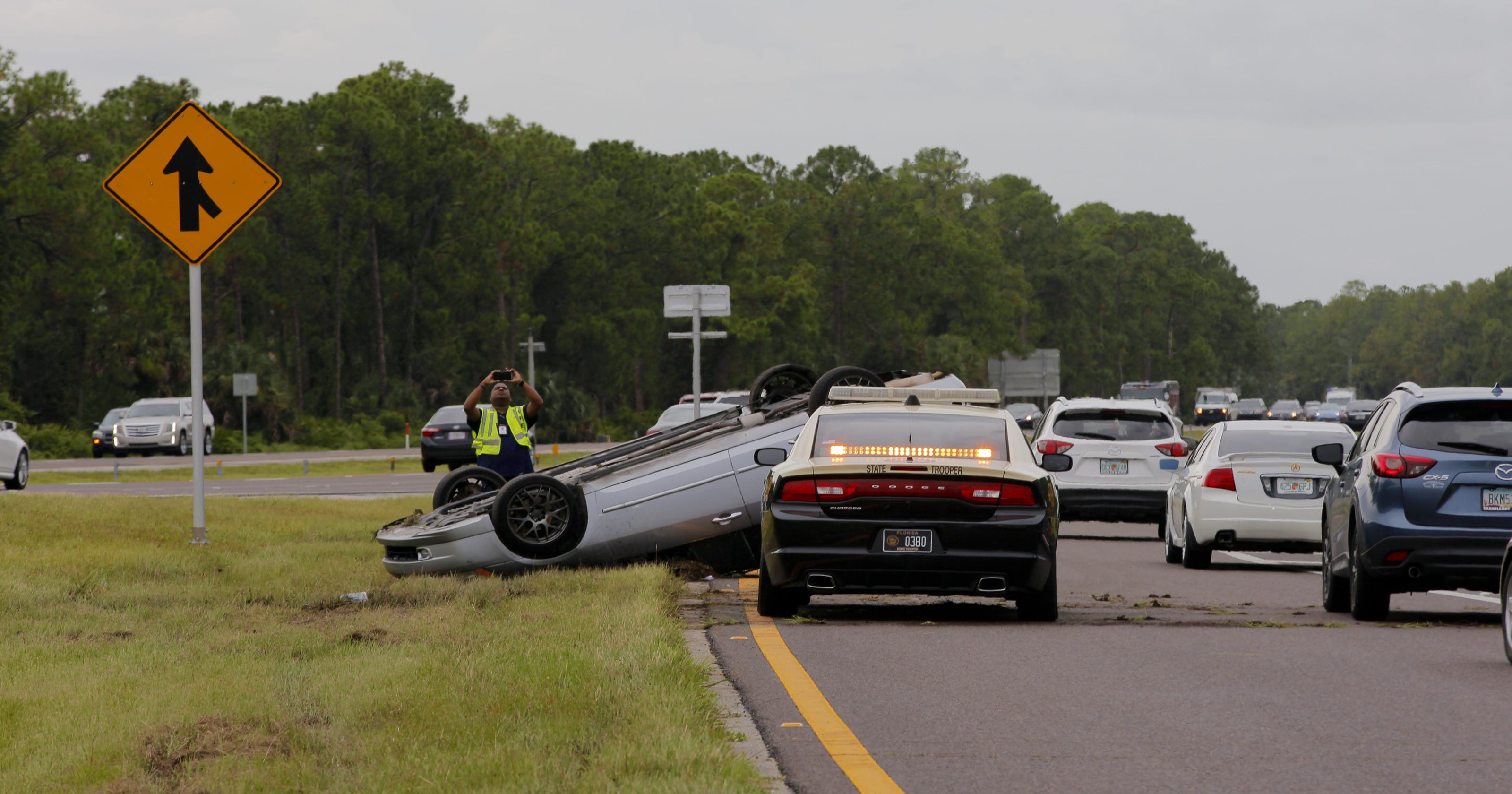 Rollover crash on I-75 and Immokalee Road slowing traffic