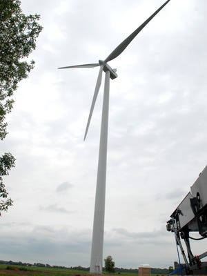 A fully erected wind turbine, standing about 300 feet tall at the center of its hub, is visible at Exelon Wind's Michigan Wind 2 site near 1746 Charleston Road, Minden, Tuesday August 2, 2011. Times Herald photo by Melissa Wawzysko.
