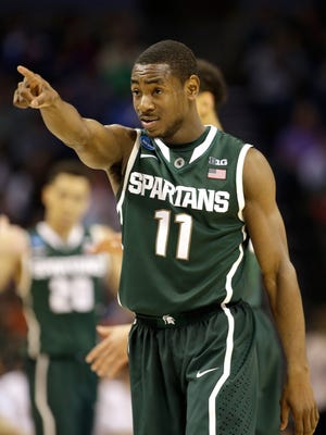 467250698.jpg CHARLOTTE, NC - MARCH 22:  Lourawls Nairn Jr. #11 of the Michigan State Spartans reacts against the Virginia Cavaliers during the third round of the 2015 NCAA Men's Basketball Tournament at Time Warner Cable Arena on March 22, 2015 in Charlotte, North Carolina.  (Photo by Bob Leverone/Getty Images)