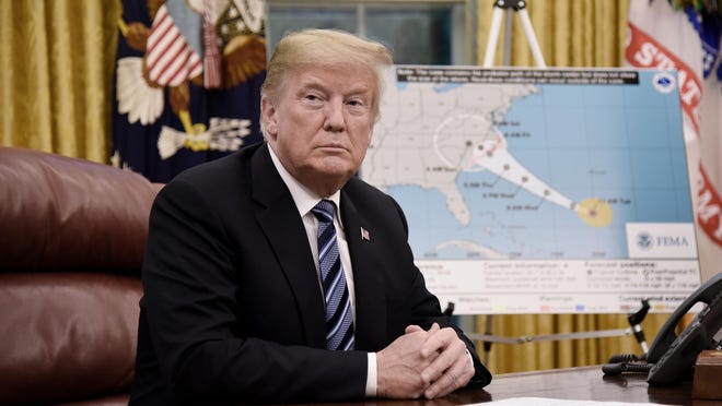 US President Donald Trump looks on during a briefing on the looming threat of Hurricane Florence with the Secretary of the Department of Homeland Security and the Administrator of the Federal Emergency Management Agency in the Oval Office of the White House, Sept. 11, 2018 in Washington, D.C. (Olivier Douliery/Abaca Press/TNS)
