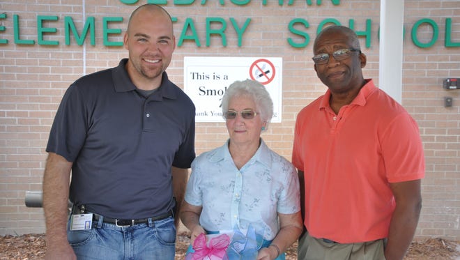 Dr. Chadwick Bacon (from left), Sebastian Elembary assistant principal; Bernice Shoffner-May, vice president of the Sebastian EL-DOES; and Tony Adkins, student support specialist at the school