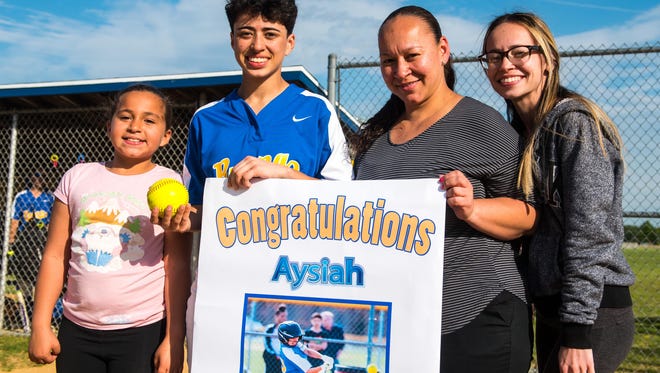 Buena third baseman Aysiah Cintron (10) with sister Leylani Muniz, Latisha Agosto and Jocelyn Cintron following a game against Holy Spirit where she set the school record at 143 career hits at Buena Regional High School on Wednesday, May 10.