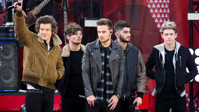 One Direction members, from left, Harry Styles, Louis Tomlinson, Liam Payne, Zayn Malik and Niall Horan on ABC's 'Good Morning America' in New York on Nov. 26, 2013. A representative for One Direction says the band’s lawyers are dealing with a video showing two band members smoking what the singers referred to as an “illegal substance.”
