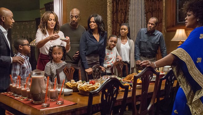 The dysfunctional-family holiday comedy "Almost Christmas" stars (left to right) Romany Malco, Alkoya Brunson, Nicole Ari Parker, Marley Taylor, J.B. Smoove, Kimberly Elise, Nadej Bailey, Gabrielle Union, Danny Glover, Mo'Nique.