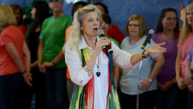 Beech Bluff Elementary School Principal Pam Betler sings 'Everything's Going to be Great' with faculty and staff Friday during their Spring Musical.