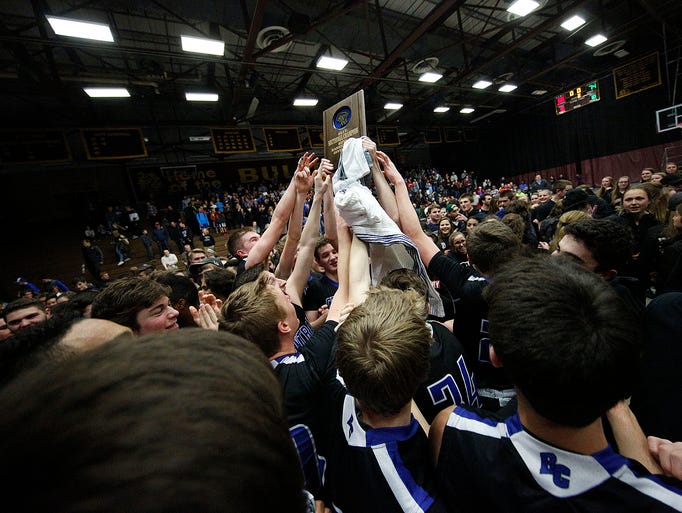 Brookfield Central Players react on the court with