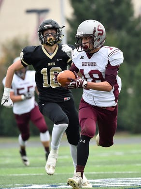 Shippensburg's Cody Gustafson (18) carries the ball up the field during the District 3 Class 4A Championship on Friday, Nov. 25, 2016 in Hershey, Pa. Berks Catholic led 21-13 at halftime.