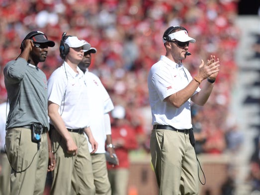 Oklahoma Sooners head coach Lincoln Riley applauds