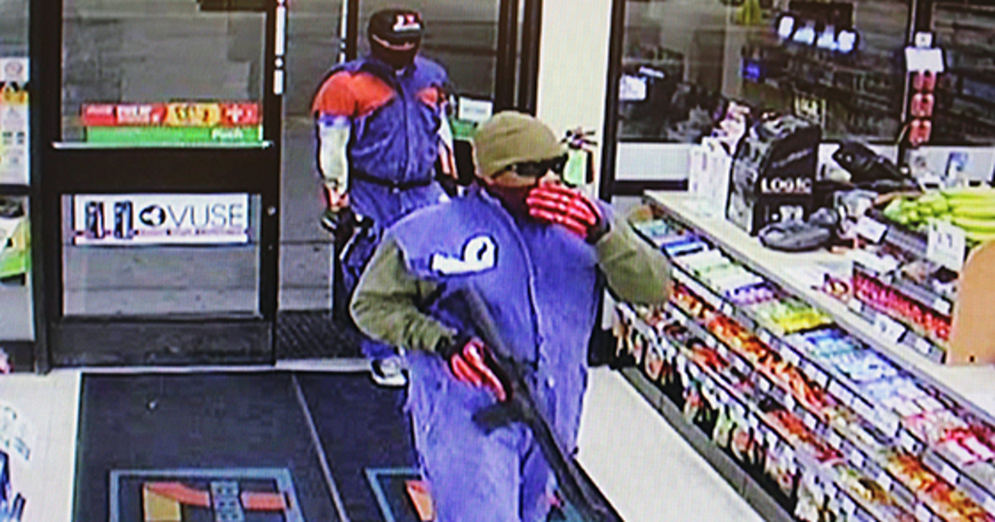 2 men arraigned in armed robbery of 7Eleven