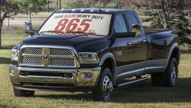  The sign on the 2015 Ram 3500 signifies a new Cummins 6.7-liter calibration that adds 15 pound-feet of torque.