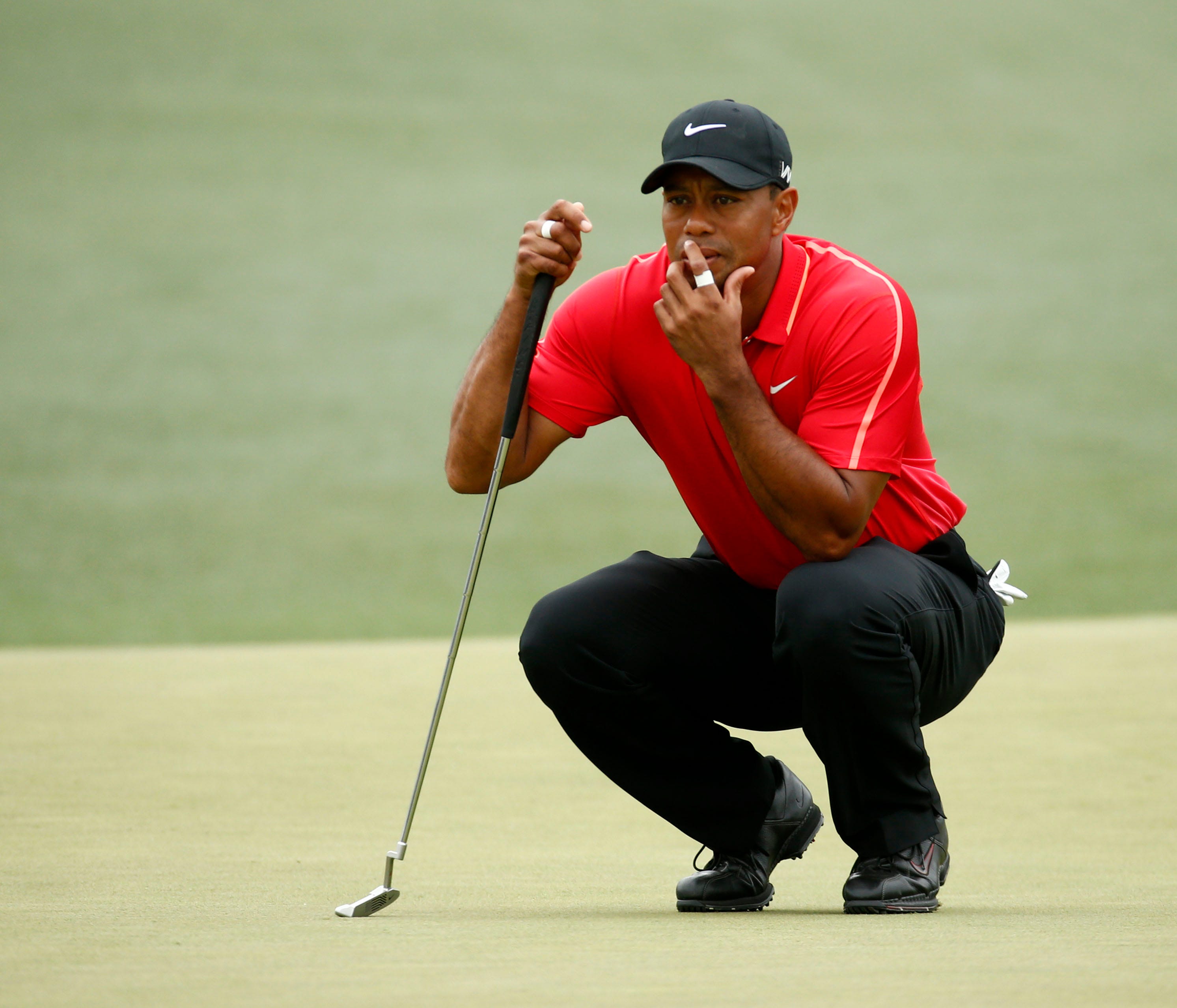 Apr 12, 2015; Augusta, GA, USA; Tiger Woods on the 2nd green during the final round of The Masters golf tournament at Augusta National Golf Club. Mandatory Credit: Rob Schumacher-USA TODAY Sports ORG XMIT: USATSI-189696 ORIG FILE ID:  20150412_jla_us