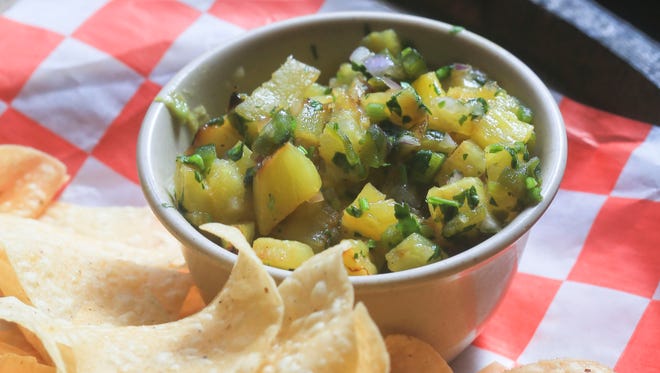 Pineapple salsa from Manny & Merle on West Main Street in downtown Louisville.  Feb. 22, 2016