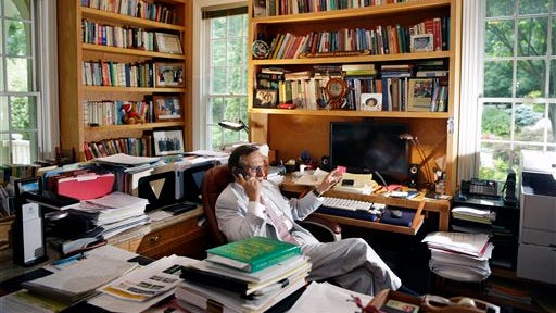 Rutgers professor Hooshang Amirahmadi sits in his office at his home Wednesday, July 9, 2014, in Princeton, N.J. An online magazine reported Wednesday that the National Security Agency and the FBI covertly scanned the emails of Amirahmadi and four other prominent Muslim-Americans under the U.S. government's secret surveillance program aimed at foreign terrorists and other national security threats.The magazine identified the targeted Muslim-Americans as lawyer Asim Ghafoor, Republican operative Faisal Gill, Rutgers University professor Hooshang Amirahmadi, activist Agha Saeed and Nihad Awad, executive director of the Council of American-Islamic Relations, a Muslim civil rights group. (AP Photo/Mel Evans)