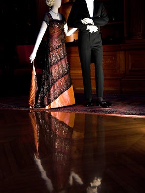 Mannequins wear evening outfits worn by Kate Winslet