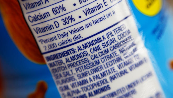 The ingredients label for almond milk at a grocery store in New York. Dairy producers are calling for a crackdown on the almond, soy and rice “milks” they say are masquerading as the real thing.