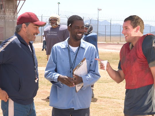 Burt Reynolds with Chris Rock and Adam Sandler in the 2005 remake of "The Longest Yard."