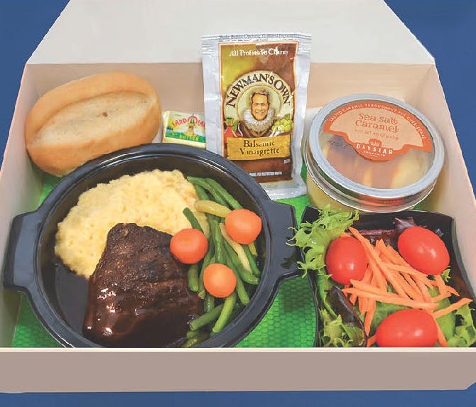 Amtrak has added a hot entree to its menus for its Capitol Limited and Lake Shore Limited sleeping car customers. It is slow braised beef short ribs in a red wine and beer sauce. It is served with Arcadian lettuce mix, julienne carrots and grape toma