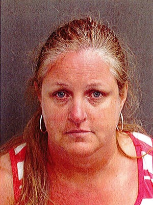 Tabbatha Kay Mature of New Baltimore s accused of child abuse after choking a teenager who refused to sit down during a fireworks display at Disney's Magic Kingdom in Orlando, FL on April 5, 2017.