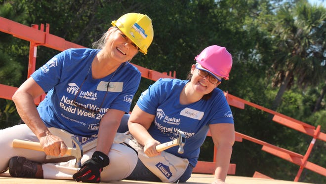 Wearing a pink hard hat, Margaret was among the volunteers at the 2017 Women Build. Later she applied for an Indian River County Habitat for Humanity home and is now a future homeowner. Dedication of her new home will take place at this year's Women Build Day on May 5. Also pictured is volunteer Sally Halstead in the yellow hard hat.