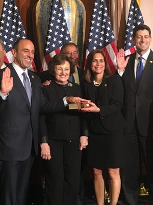 House Speaker Paul Ryan, far right, swears in Jimmy Panetta as representative of California’s 20th Congressional District Tuesday in Washington, D.C.  To the new congressman’s left are his mom, Sylvia; his dad, Leon; and his wife, Carrie.
