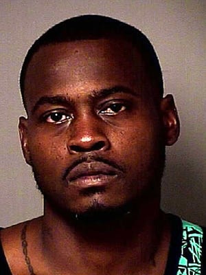 This photo released by the Osceola County Sheriff's Office shows Tarvaris Jackson. The former Seattle Seahawks quarterback  was arrested in central Florida after authorities say he pulled a gun on his wife. An Osceola County Sheriff's Office arrest report says the 33-year-old Jackson had been visiting family in Kissimmee when the incident occurred early Friday, June 24, 2016. 
(Osceola County Sheriff's Office via AP)