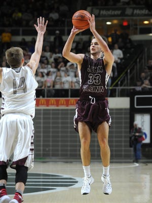 John Glenn's Drew Rackley puts up a shot against Vinton County in the regional semifinal. Rackley earned All-Ohio honors for the third time in his career.