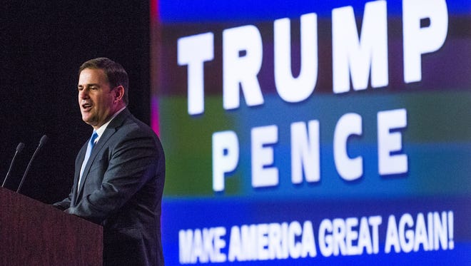 Arizona Gov. Doug Ducey addresses a Trump-Pence rally at the Mesa Convention Center on Nov. 2, 2016.
