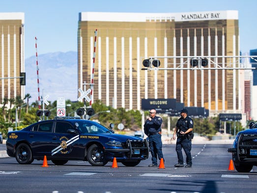 Police stand at a roadblock on Las Vegas Blvd. at Sunset