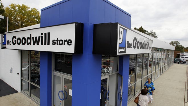 Shoppers go into a Goodwill store in Paramus, N.J.