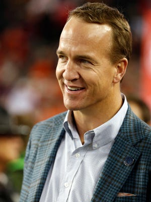 Peyton Manning in attendance for the 2017 College Football Playoff National Championship Game between the Alabama Crimson Tide and the Clemson Tigers.