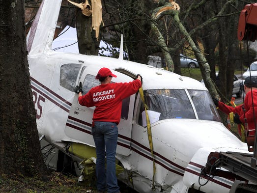 An aircraft recovery team from Clarksville and FAA