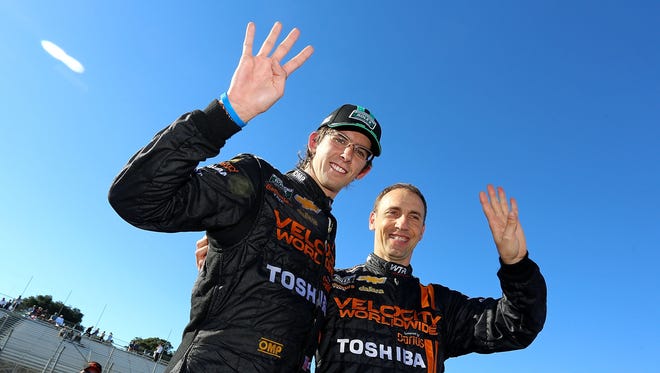 Jordan Taylor, left, and Max Angelelli won the Grand-Am Rolex Series race championship Saturday.